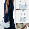 bolso de hombro Guess Noelle. 