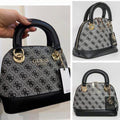 satchel pequeño de cúpula Guess Cathleen. 